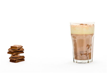 Hot chocolate and stack of chocolate bars Stock Photo - Premium Royalty-Free, Code: 6102-04929918