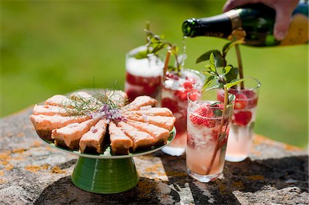 fruit garnish for cocktail - Salmon fish on plate with cocktail Stock Photo - Premium Royalty-Free, Code: 6102-05655403