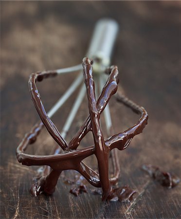 Sticky chocolate on whisk Fotografie stock - Premium Royalty-Free, Codice: 6102-05802538