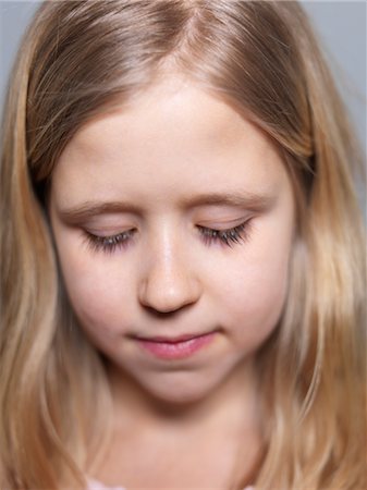 sad lonely girl - Studio portrait of blonde girl Stock Photo - Premium Royalty-Free, Code: 6102-05802625