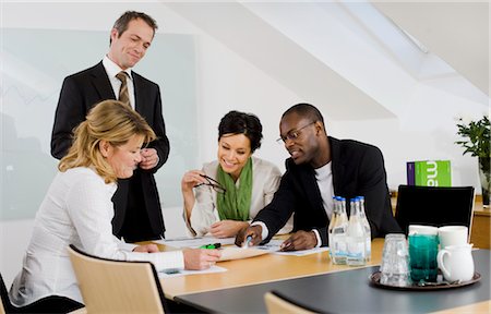 simsearch:6102-08881555,k - Business meeting in conference room Stock Photo - Premium Royalty-Free, Code: 6102-05955958