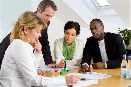 simsearch:6102-06026005,k - Business meeting in conference room Stock Photo - Premium Royalty-Free, Code: 6102-05955959