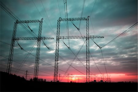 electric tower looking up - Electricity line at sunset Stock Photo - Premium Royalty-Free, Code: 6102-05955918