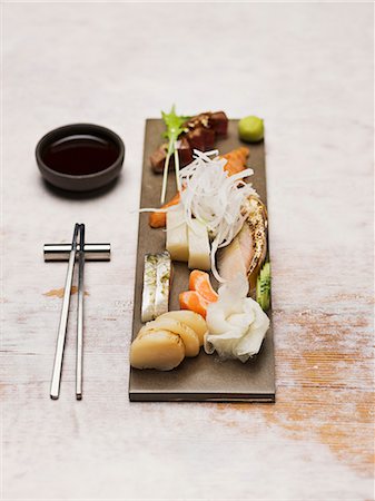sushi and chop sticks - Close-up of Sashimi Stock Photo - Premium Royalty-Free, Code: 6102-06336679