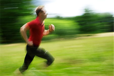 directional abstract - A man running in the forest, Sweden. Stock Photo - Premium Royalty-Free, Code: 6102-06470328