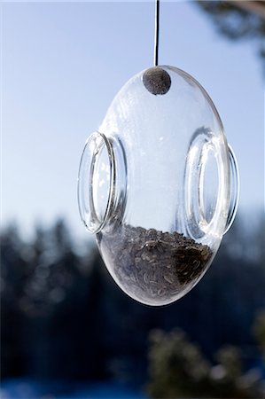 semilla (para pájaro) - A bird feeder made of glass, Sweden. Foto de stock - Sin royalties Premium, Código: 6102-06470452