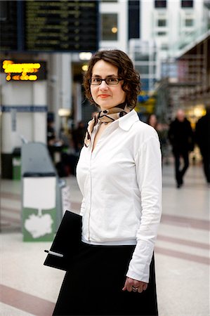 Portrait of a hostess at a station, Stockholm, Sweden. Stock Photo - Premium Royalty-Free, Code: 6102-06470468