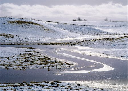 A small river in a snowy landscape, Sweden. Stock Photo - Premium Royalty-Free, Code: 6102-06470670