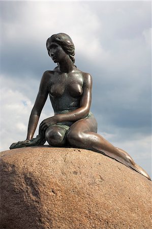 A statue of The Little Mermaid, Copenhagen, Denmark. Stock Photo - Premium Royalty-Free, Code: 6102-06470756