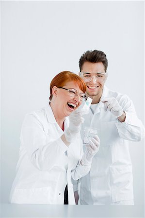 simsearch:6102-06470881,k - Two scientists working in laboratory Stock Photo - Premium Royalty-Free, Code: 6102-06470882