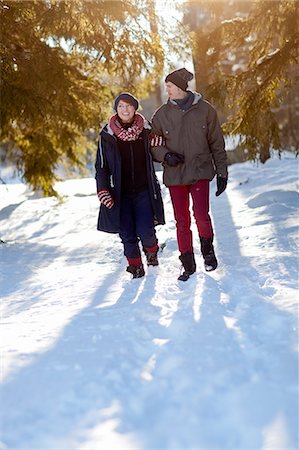 stockholm - Couple walking in winter forest Stock Photo - Premium Royalty-Free, Code: 6102-06470964