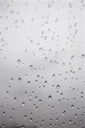 Raindrops on glass, close-up Photographie de stock - Premium Libres de Droits, Code: 6102-06470998