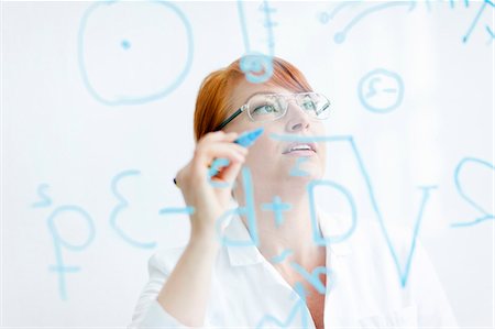 simsearch:6102-06470881,k - Female scientist working in laboratory Stock Photo - Premium Royalty-Free, Code: 6102-06470920