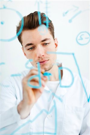 Male scientist working in laboratory Foto de stock - Sin royalties Premium, Código: 6102-06470922