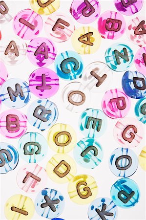 simsearch:6102-08942324,k - Multicolored letters on white background Foto de stock - Sin royalties Premium, Código: 6102-06471040