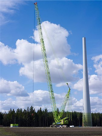 simsearch:6102-03905067,k - Construction of wind turbine Photographie de stock - Premium Libres de Droits, Code: 6102-06471097