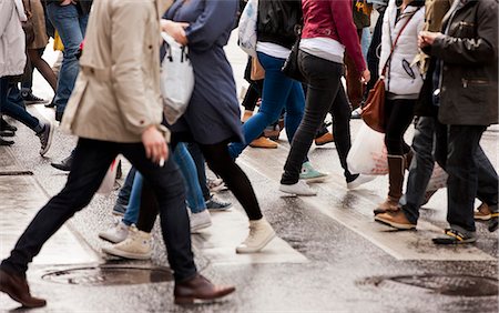 Close-up of people on zebra crossing Photographie de stock - Premium Libres de Droits, Code: 6102-06471155