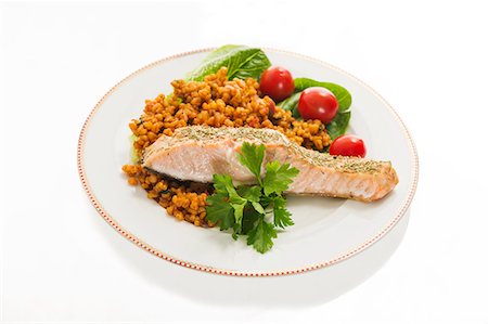 simsearch:6102-07157985,k - Salmon on plate, studio shot Stock Photo - Premium Royalty-Free, Code: 6102-06471193