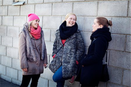 scandinavia winter woman - Three young women laughing together Stock Photo - Premium Royalty-Free, Code: 6102-06471258