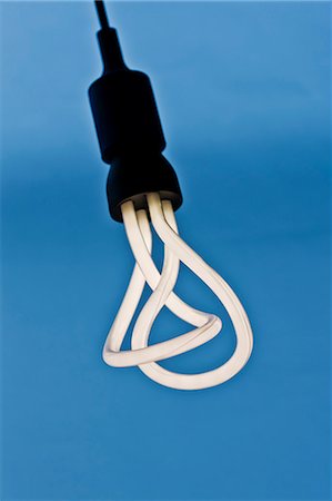 electrical cord nobody - Light bulb on white background, studio shot Stock Photo - Premium Royalty-Free, Code: 6102-06777570