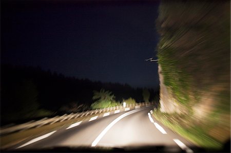 simsearch:6102-06965609,k - Curvy road at night Stock Photo - Premium Royalty-Free, Code: 6102-06777527