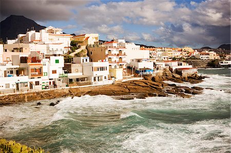 View of coastal village during storm Stock Photo - Premium Royalty-Free, Code: 6102-06777644