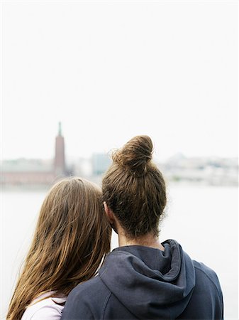 stockholm city hall - Rear view of young couple looking at view Stock Photo - Premium Royalty-Free, Code: 6102-06777732