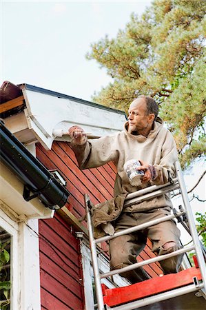 diy or home improvement - Man on ladder painting house Foto de stock - Sin royalties Premium, Código: 6102-06965422
