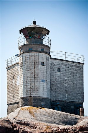 simsearch:6102-07602862,k - Low angle view of lighthouse Foto de stock - Sin royalties Premium, Código: 6102-06965549