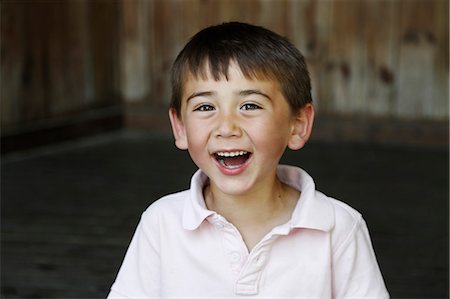 extático - Portrait of laughing boy Foto de stock - Sin royalties Premium, Código: 6102-06965594