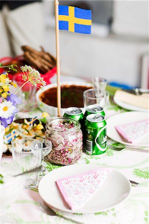 swedish flag - Place setting with Swedish flag Stockbilder - Premium RF Lizenzfrei, Bildnummer: 6102-06965630