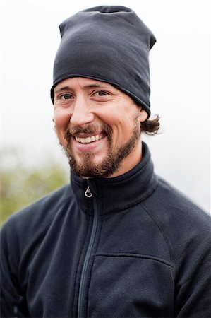 scandinavian - Portrait of smiling mid adult man Stock Photo - Premium Royalty-Free, Code: 6102-06965632