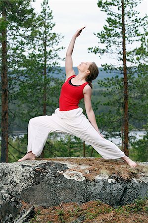 simsearch:6102-06965769,k - Young woman doing yoga Stockbilder - Premium RF Lizenzfrei, Bildnummer: 6102-06965761