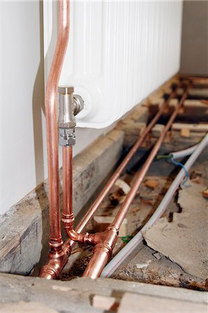 Close-up of central heating pipes Photographie de stock - Premium Libres de Droits, Code: 6102-06965771