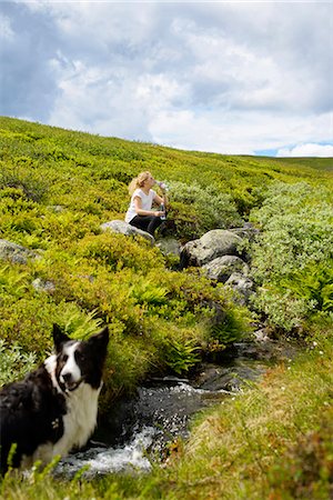 Hiker drinking water Stock Photo - Premium Royalty-Free, Code: 6102-06965800