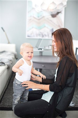 Mother with toddler playing together Stock Photo - Premium Royalty-Free, Code: 6102-07158098