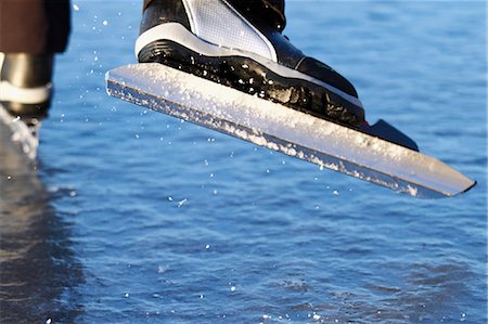 simsearch:6102-07158028,k - Close-up of ice-skater Stock Photo - Premium Royalty-Free, Code: 6102-07158024