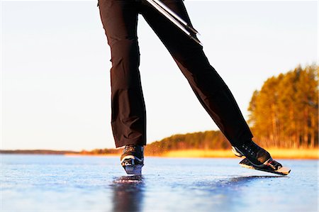 simsearch:6102-07158039,k - Woman long-distance skating, low section Stock Photo - Premium Royalty-Free, Code: 6102-07158034