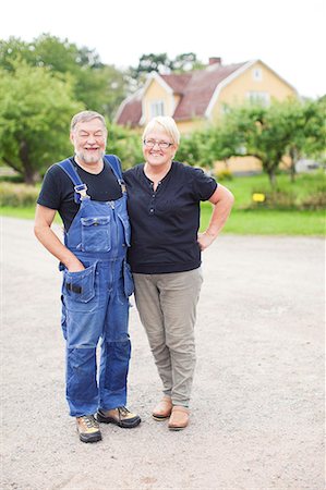 farmer with overalls - Senior couple standing together Stock Photo - Premium Royalty-Free, Code: 6102-07158355