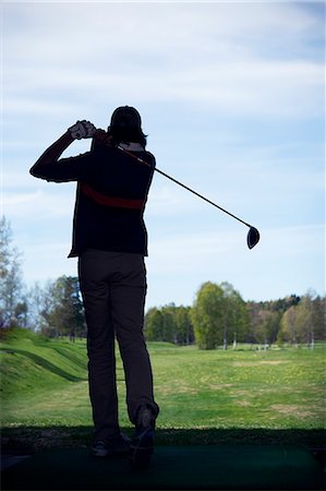 simsearch:6102-05955851,k - Silhouette of man playing golf Stockbilder - Premium RF Lizenzfrei, Bildnummer: 6102-07158377