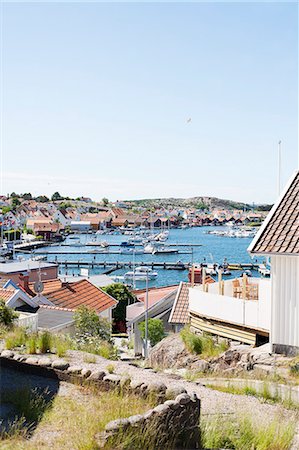 simsearch:6102-07844242,k - View of harbor with moored boats, Fjallbacka, Bohuslan, Sweden Foto de stock - Sin royalties Premium, Código: 6102-07158319