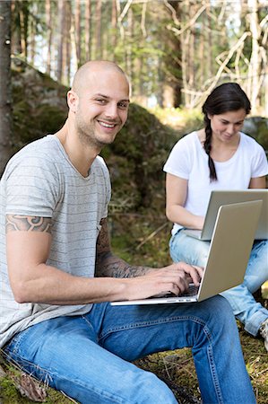 simsearch:6102-03828856,k - Couple in forest using laptops, Sweden Stockbilder - Premium RF Lizenzfrei, Bildnummer: 6102-07158403
