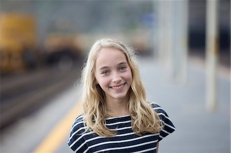Portrait of smiling teenage girl Stock Photo - Premium Royalty-Free, Code: 6102-07282611