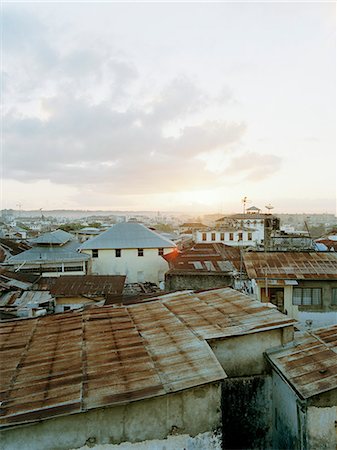 View of city roofs, Zanzibar, Tanzania Photographie de stock - Premium Libres de Droits, Code: 6102-07455725