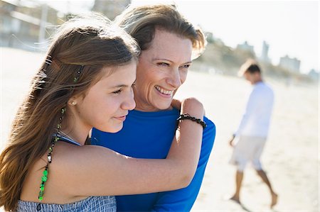 Mother with daughter on beach Stock Photo - Premium Royalty-Free, Code: 6102-07521598