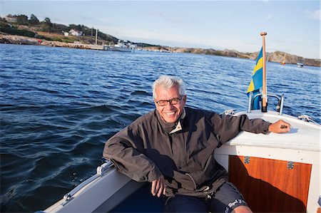 simsearch:6102-07602696,k - Senior man on sea, Grundsund, Bohuslan, Sweden Fotografie stock - Premium Royalty-Free, Codice: 6102-07602655