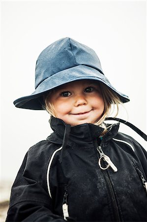 simsearch:6102-08542248,k - Portrait of smiling girl, Kebnekaise, Lapland, Sweden Foto de stock - Royalty Free Premium, Número: 6102-07602890