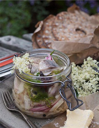 simsearch:6102-07842873,k - Marinated herring in jar, Sweden Stock Photo - Premium Royalty-Free, Code: 6102-07602938