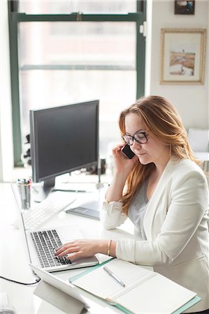 personal organizer - Mid adult woman in office, New Jersey, USA Stock Photo - Premium Royalty-Free, Code: 6102-07768484