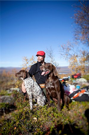 simsearch:6102-08001342,k - Man hunting, Nikkaluokta, Norrbotten, Lapland, Sweden Stock Photo - Premium Royalty-Free, Code: 6102-07768678